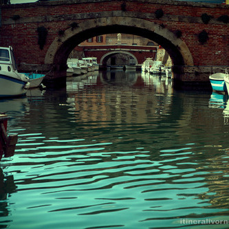 Visit Livorno by boat along the canals